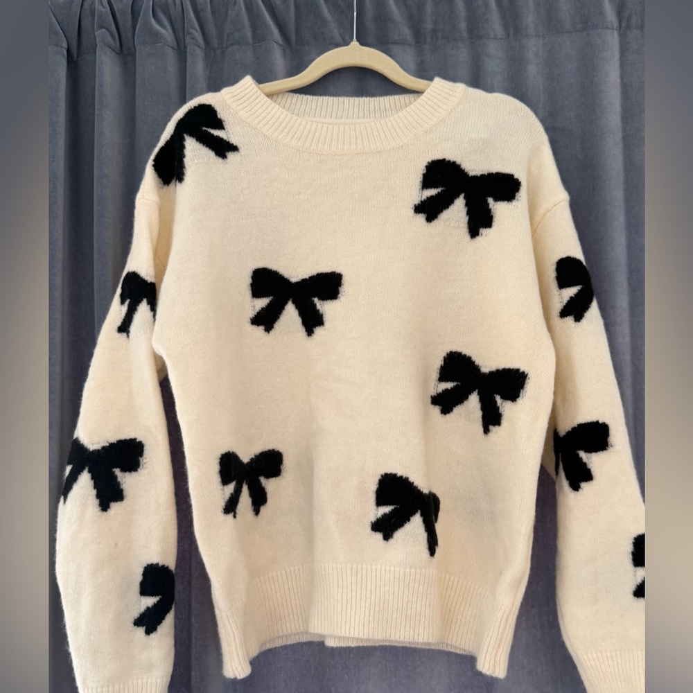 Women's Cream Sweater with Black Bow Accents